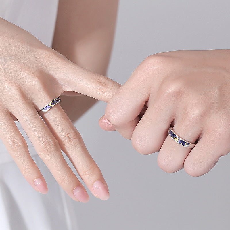 A Pair Of Men's And Women's Day And Moon Rings