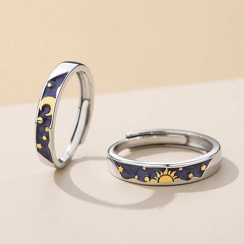 A Pair Of Men's And Women's Day And Moon Rings