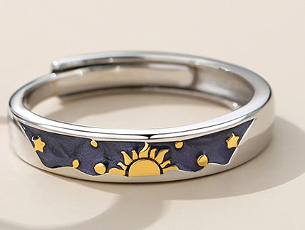 A Pair Of Men's And Women's Day And Moon Rings