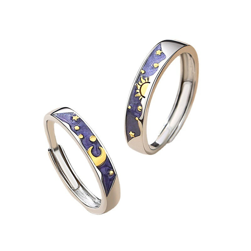 A Pair Of Men's And Women's Day And Moon Rings